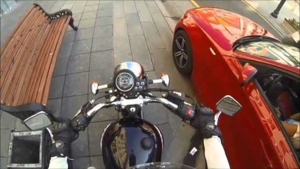 elusive-girl-on-a-motorcycle-against-debris