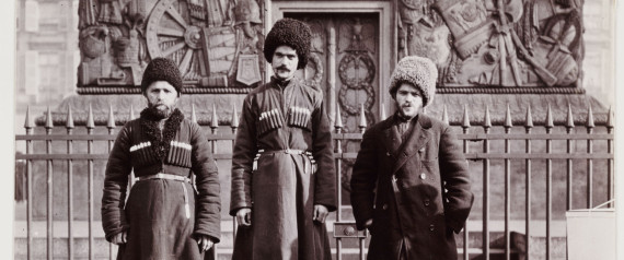 Tourist and Cossacks, Russia, c 1910.